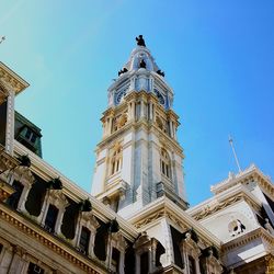 Low angle view of church against blue sky