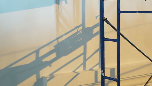 Shadow of railing on staircase