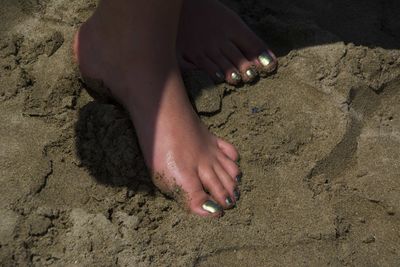Low section of woman at beach