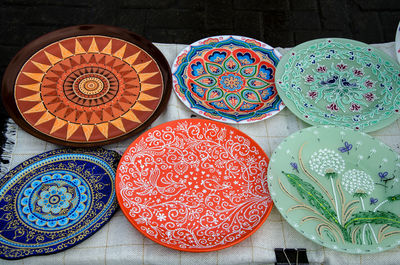 High angle view of colorful plates for sale