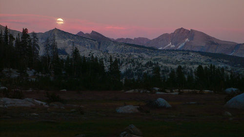 Scenic view of mountains against sky during sunset