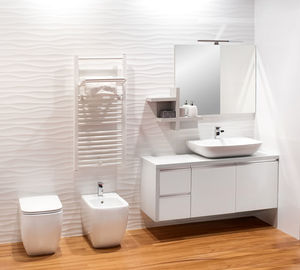 Interior of illuminated bathroom