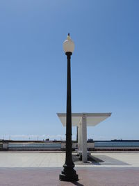 View of sea against clear blue sky