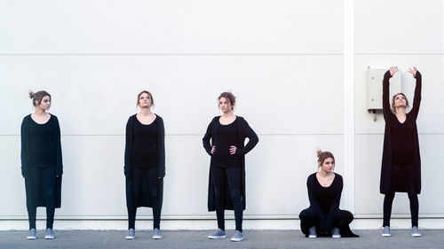 Multiple image of young woman against wall