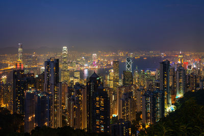 Illuminated cityscape at night