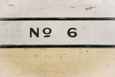 Close-up of text on wall