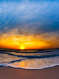 Scenic view of sea against sky during sunset