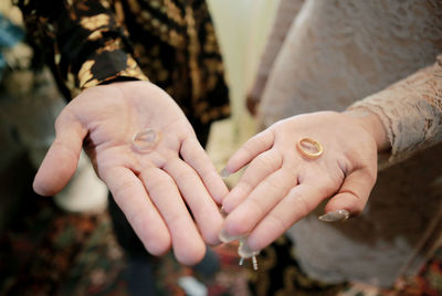 Close-up of hand holding hands