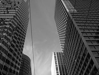 Low angle view of modern buildings against sky