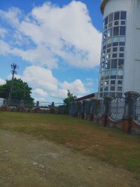 Built structure against cloudy sky