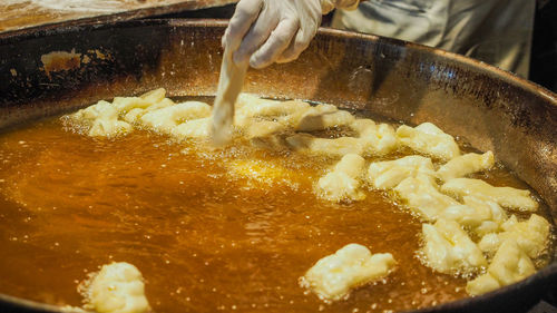 Close-up of person preparing food