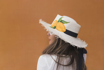 Portrait of beautiful hispanic woman with a hat