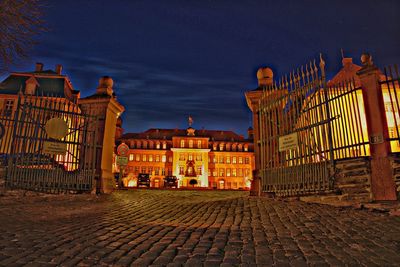 Illuminated buildings in city at night