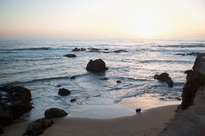 Scenic view of sea against sky during sunset