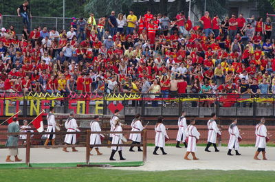 Group of people in front of wall