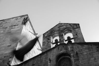 Low angle view of historic building against clear sky