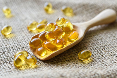 Close-up of yellow and spoon on table
