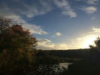 Scenic view of landscape against cloudy sky