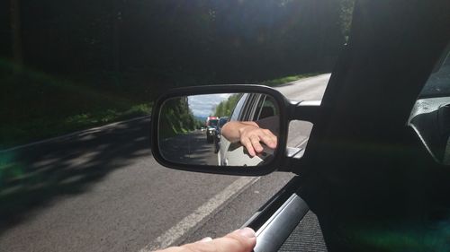 Reflection of people in train