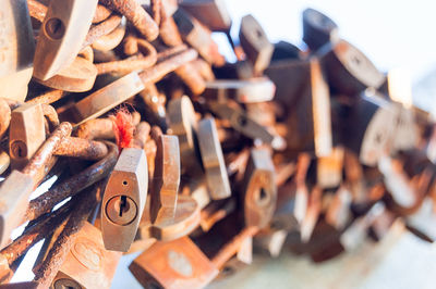 Close-up of rusty padlocks with chain