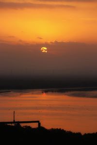 Scenic view of dramatic sky during sunset