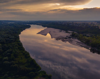 Scenic view of landscape against sky during sunset