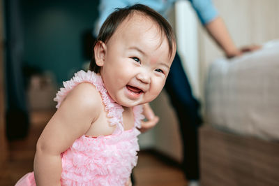 Portrait of cute baby at home