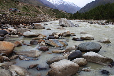 Scenic view of landscape and mountains against sky