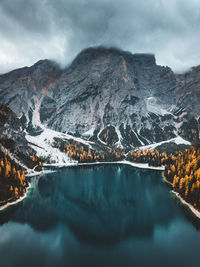 Aerial view of snowcapped mountains against sky