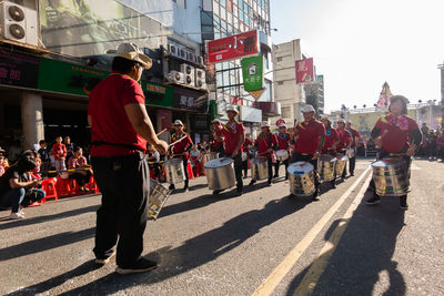People on street in city