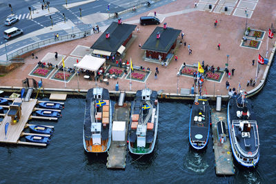High angle view of boats moored on sea at harbor