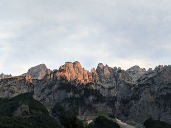 Scenic view of rocky mountains against sky