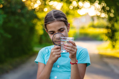 Young woman drinking coffee