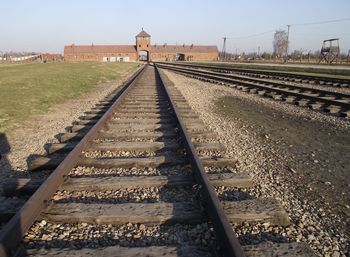 Railroad tracks against clear sky