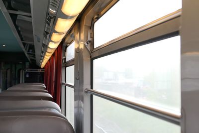 Seats by window in train