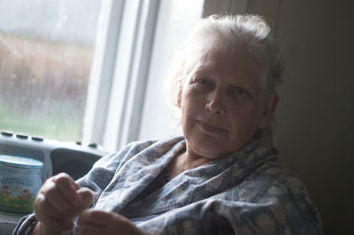 Close-up of woman looking at camera