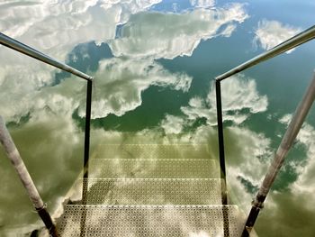 Low angle view of metallic structure against sky