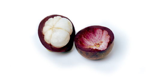High angle view of fruits against white background