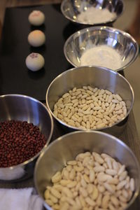 High angle view of various beans in bowl on table