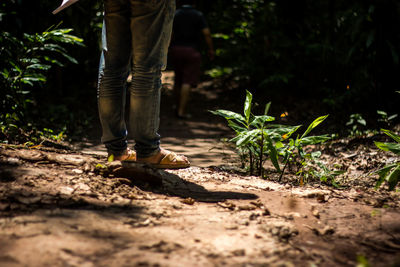 Low section of person standing on ground