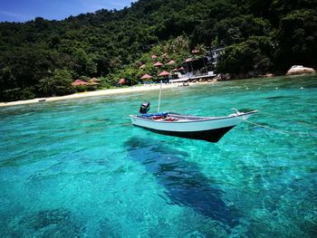 Boat moored on sea