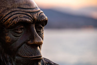 Close-up of statue against sky