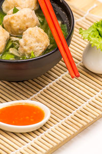 Close-up of food in bowl on place mat