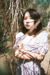 Portrait of a young woman in a forest