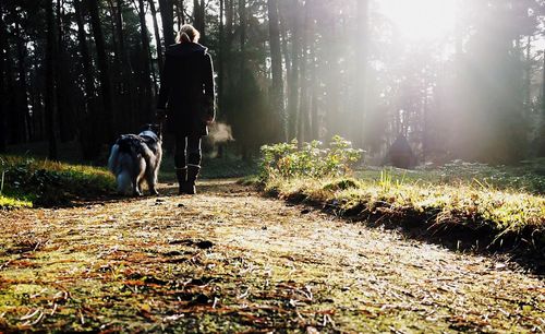 Woman walking with dog