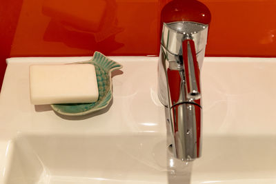 High angle view of faucet in bathroom