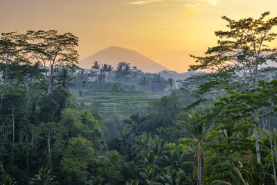 Scenic view of mountains against sky during sunset