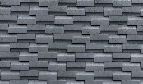 Gray brick wall with simple pattern. gray wall texture abstract background. modern brick wall.
