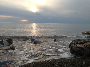 Scenic view of sea against sky during sunset