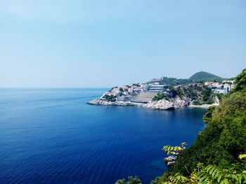 Scenic view of sea against clear sky